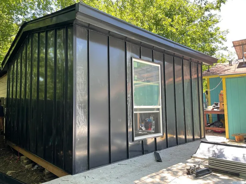 Black standing seam metal wall panels for Metal Roof Installation in Warrenville